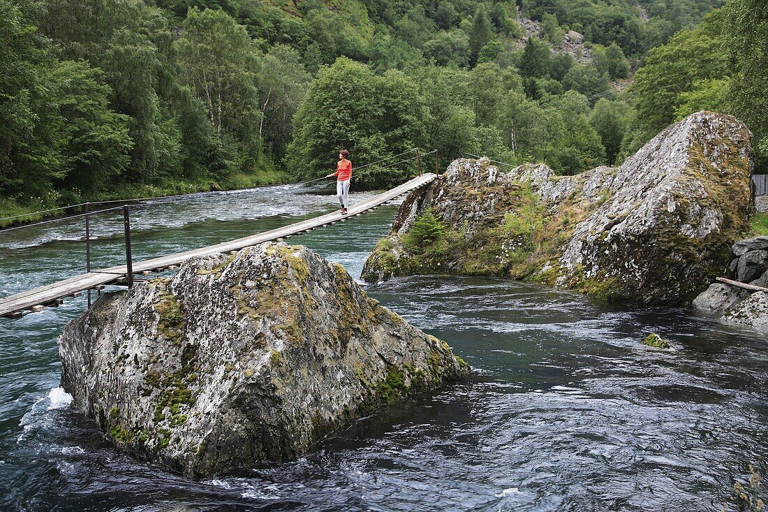 Norway, Flam, suspended bridge over river