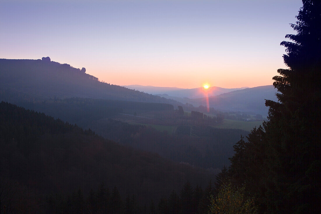 View onto the rock formation Bruchhauser Steine at sunset, Rothaarsteig hiking trail, near Olsberg-Bruchhausen, Rothaargebirge, Sauerland, North Rhine-Westphalia, Germany, Europe