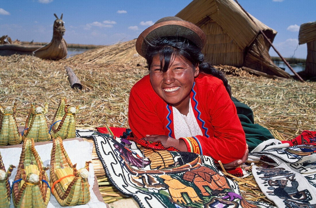 Uros Indian woman with artisan goods, Lake Titicaca, Peru