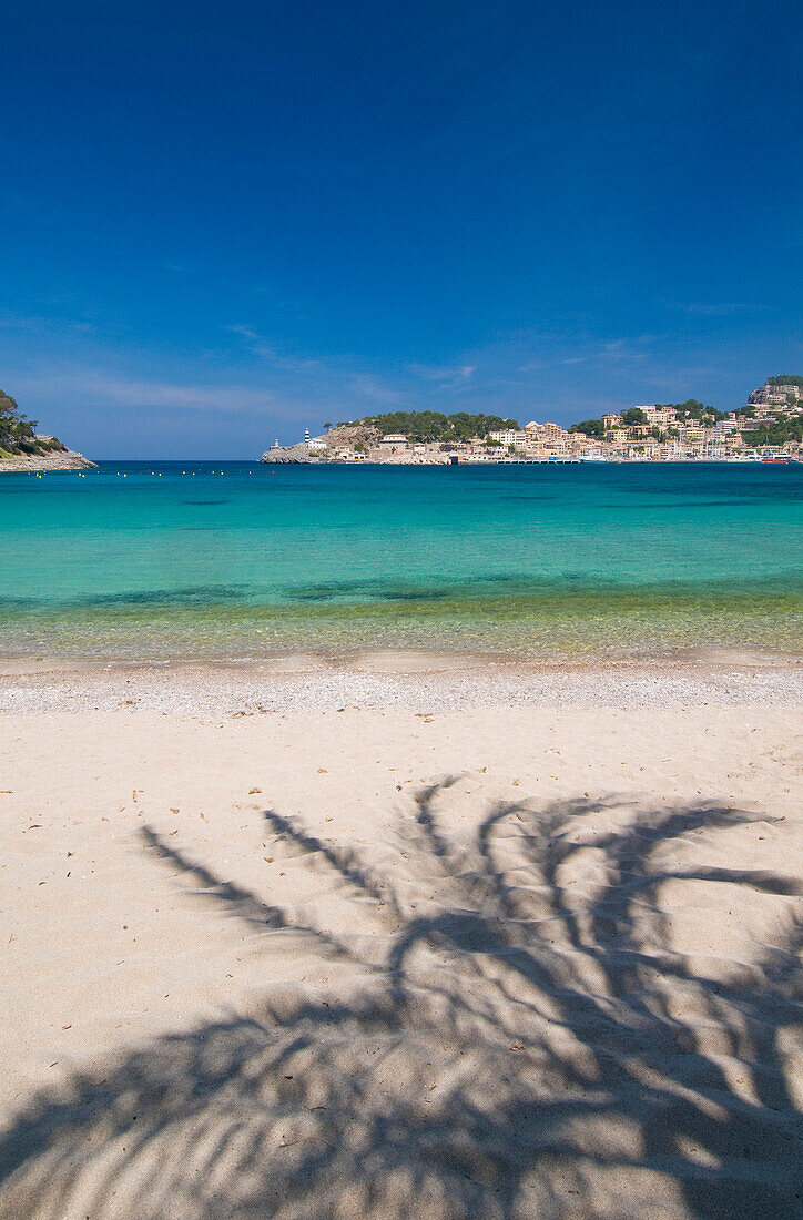 Shadow of palm tree on Puerto de Soller beach, Majorca, Ballearic Islands, Spain