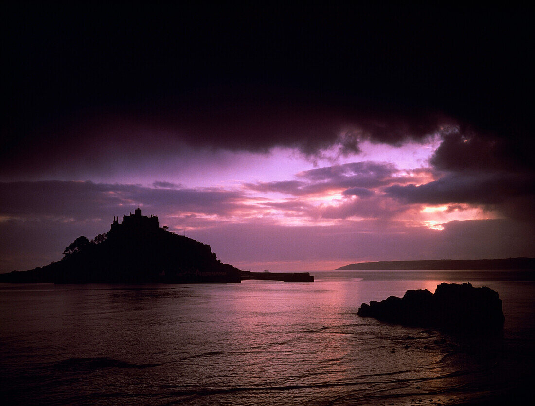 Pink sky over St. Michael's Mount, Penwith, Cornwall, England, United Kingdom.