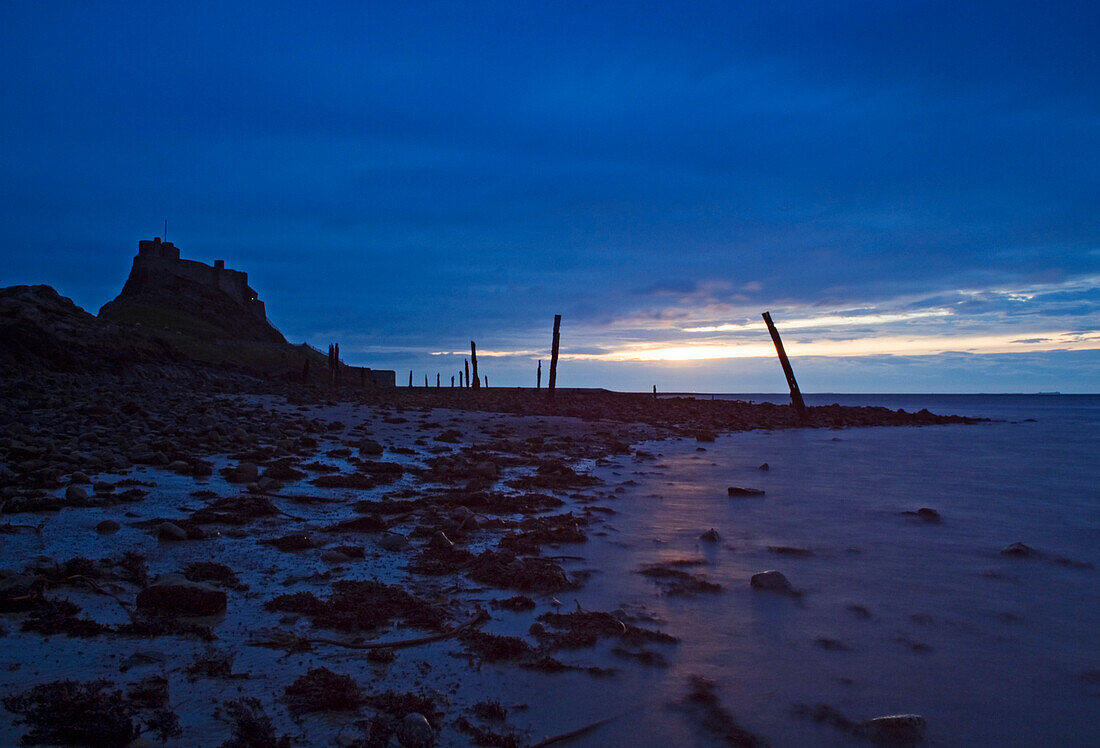 Lindisfarne Castle on Holy Island at dusk, Northumberland, England, United Kingdom.