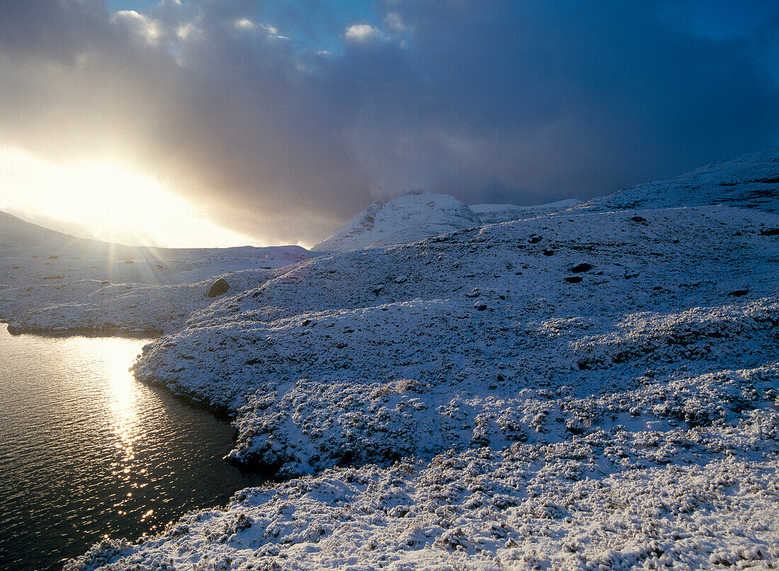 Fresh winter snow and lake, Torridon Range, West Coast, Scotland