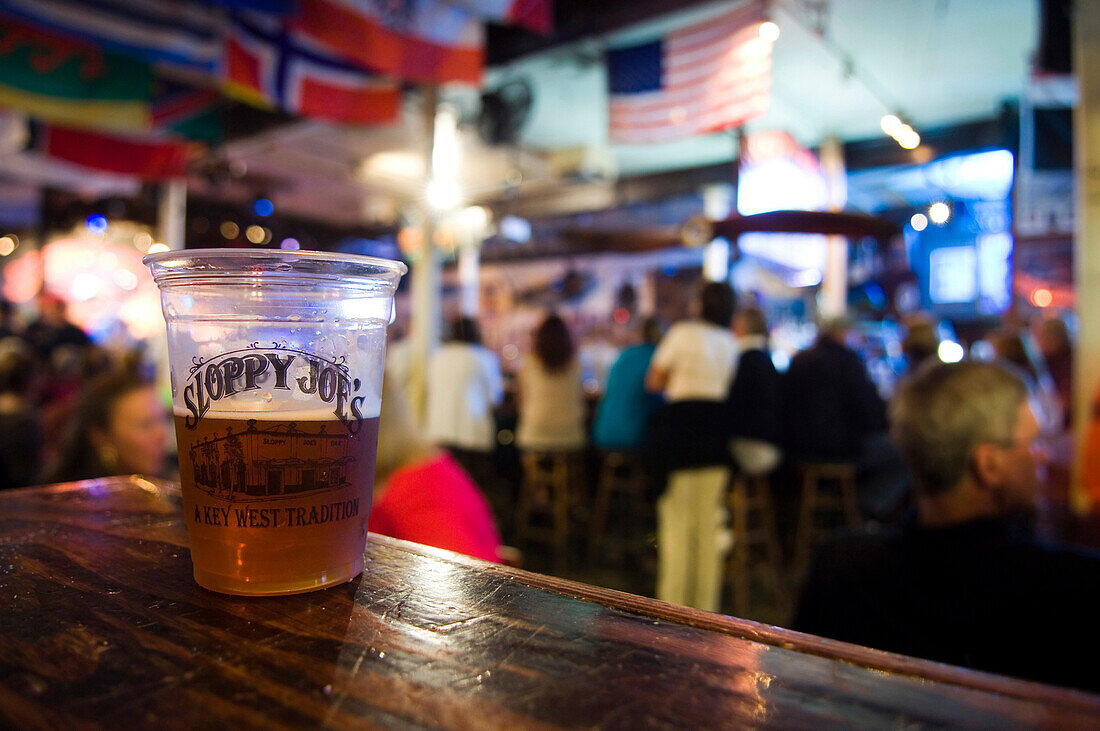 Interior of Sloppy Joes bar showing a glass of beer. Duval Street. Key West. Florida Keys.
