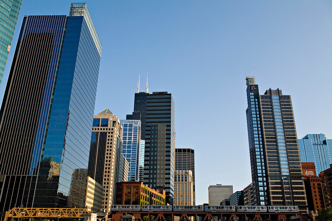 Train going through Lake Street Bridge, low angle view, Chicago, Illinois, USA