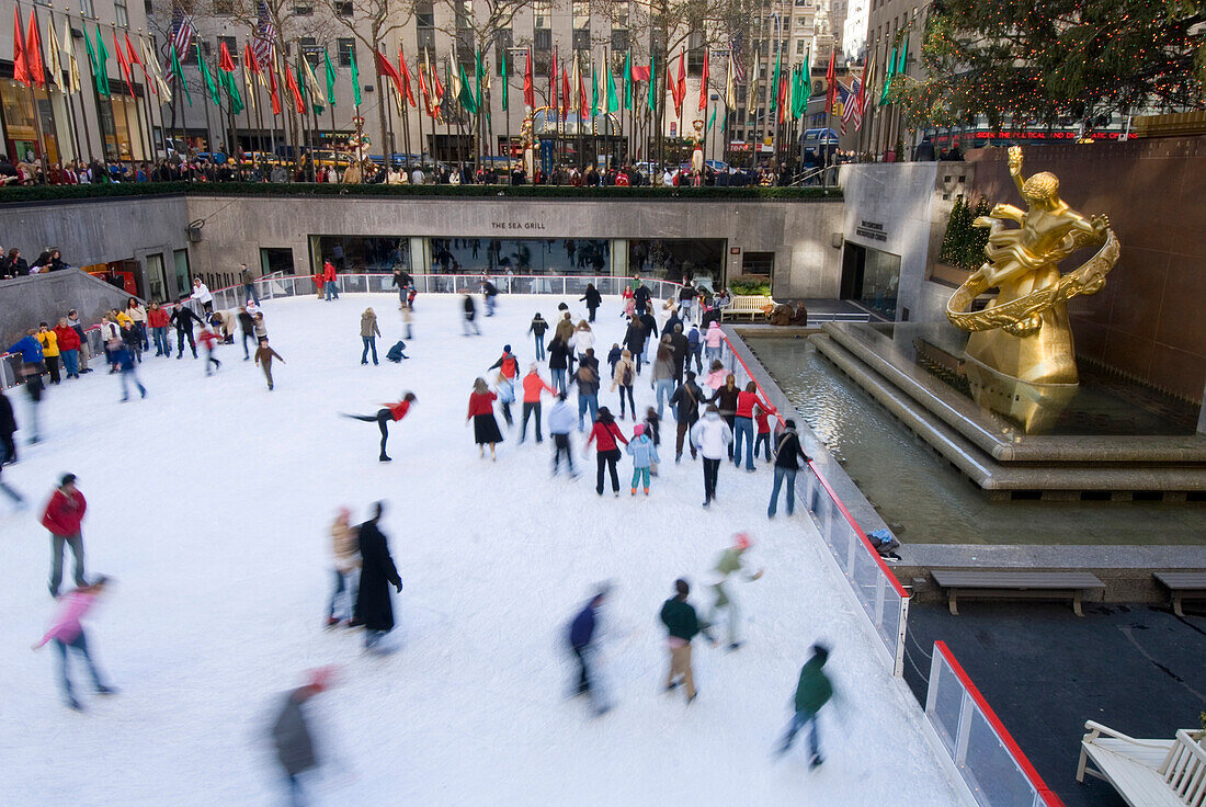 Ice skaters in Rockefeller Center, New York City, USA
