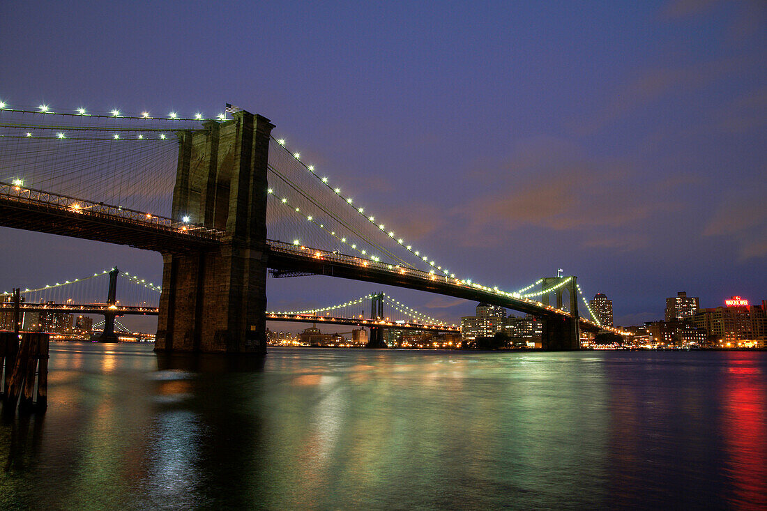 The Broklyn Bridge (foreground) and the Manhattan Bridge, viewed from South Street Seaport, New York City, New York, United States