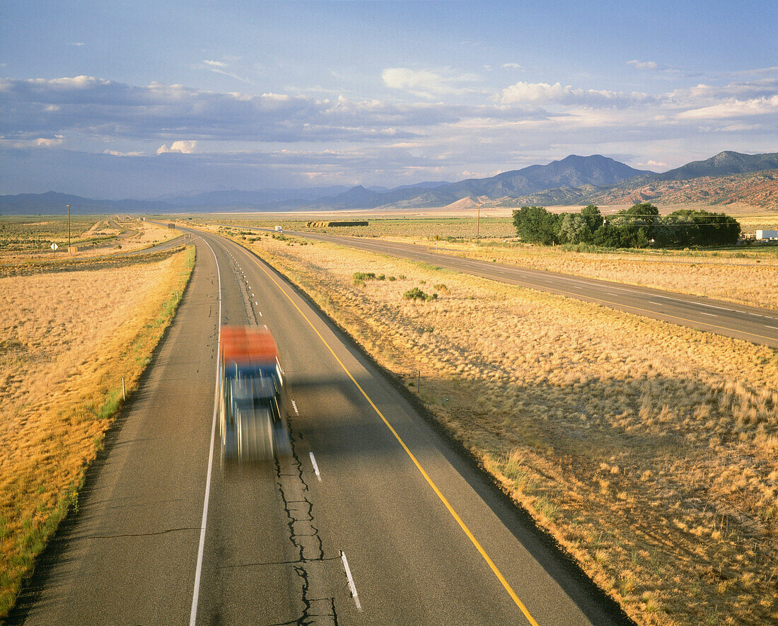 Truck on highway, blurred motion, Utah, United States