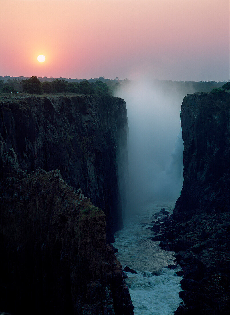 Looking along Victoria Falls at dusk from Zambia to Zimbabwe, Zambia