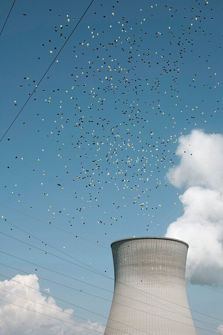 Balloons flying over a cooling tower, demonstration against the nuclear power plant at Gundremmingen, Bavaria, Germany