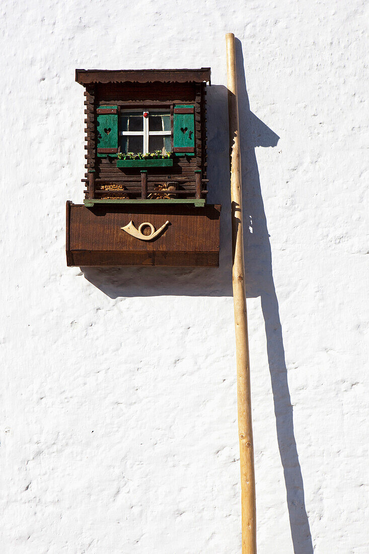 Bavarian style lovingly designed letter box on a house wall, Mittenwald, Bavaria, Germany