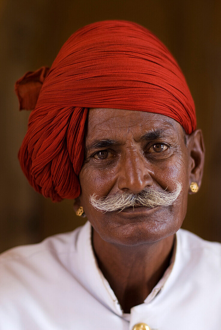 A palace guard in the City Palace, Jaipur, Rajasthan, India