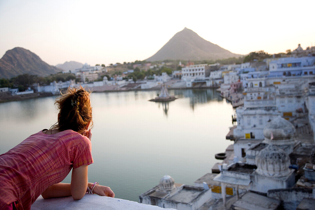 Woman admiring view of Pushkar, Pushkar, Rajasthan, India