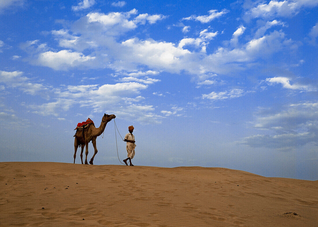 Man with camel in Thar Desert, India