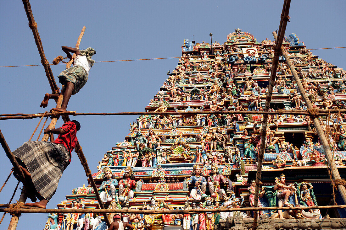 Men working on scaffolding in front of Kapaleeshwarar Temple, Mylapore, Chennai, India