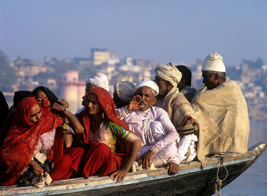 Ferry with local people on River Ganges at Varanasi, Uttar Pradesh, India
