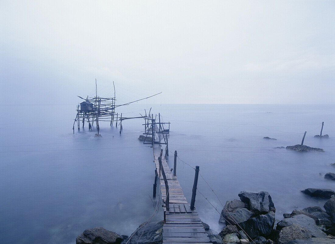 Old fishing platform at dusk, San Vito Chietino, Abruzzo, Italy.