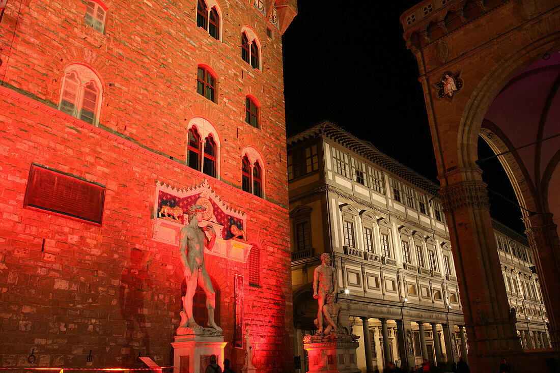 Illuminated statue in front of Uffizi Gallery at Palazzo Vecchio, night, Florence, Tuscany, Italy