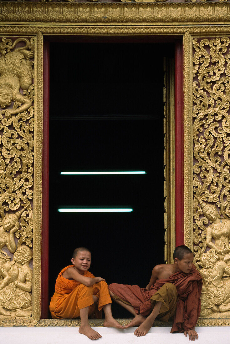 Monks in the window  , Luang Prabang, Laos.