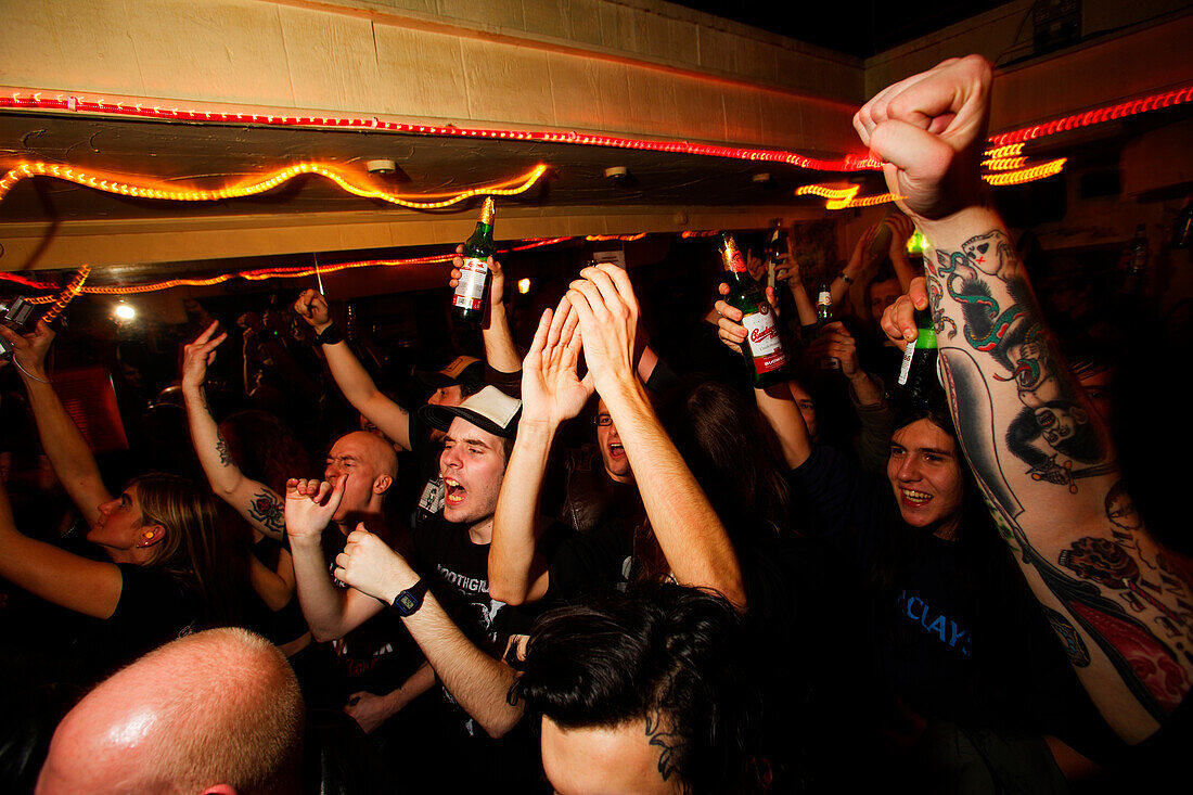 Crowd cheering during rock gig at The CroBar, London, England