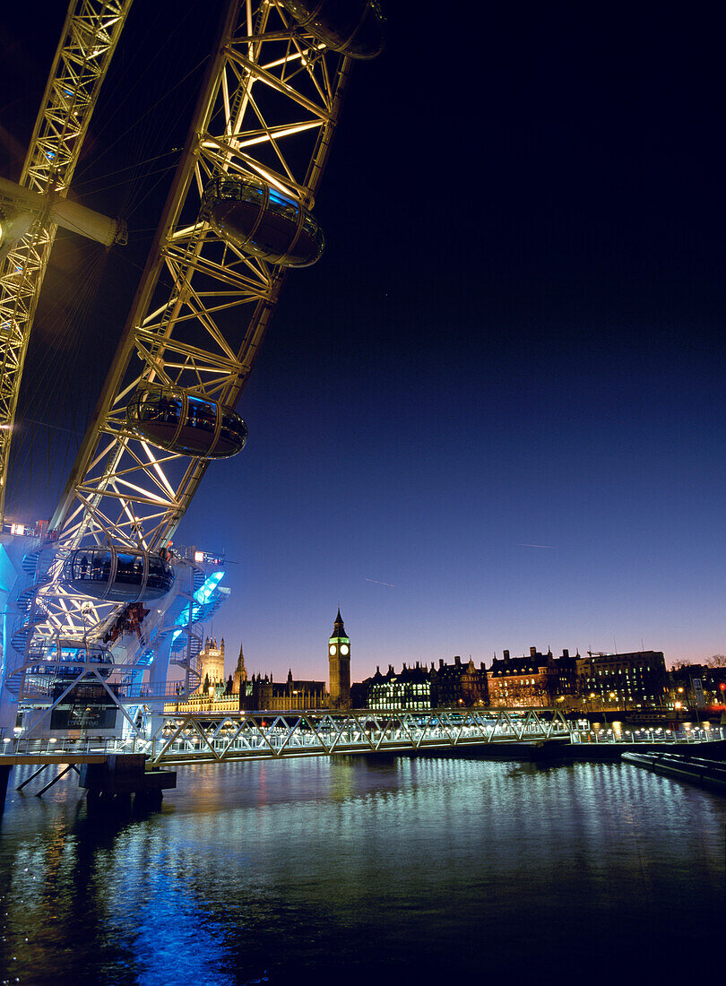 London Eye and Houses of Parliament at dusk, London, England