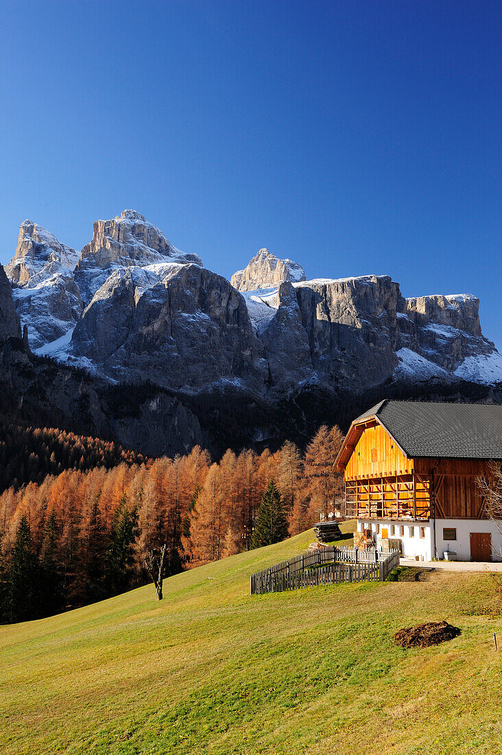 Farmhouse in front of rock faces of Sella range, Corvara, Dolomites, UNESCO World Heritage Site Dolomites, South Tyrol, Italy, Europe