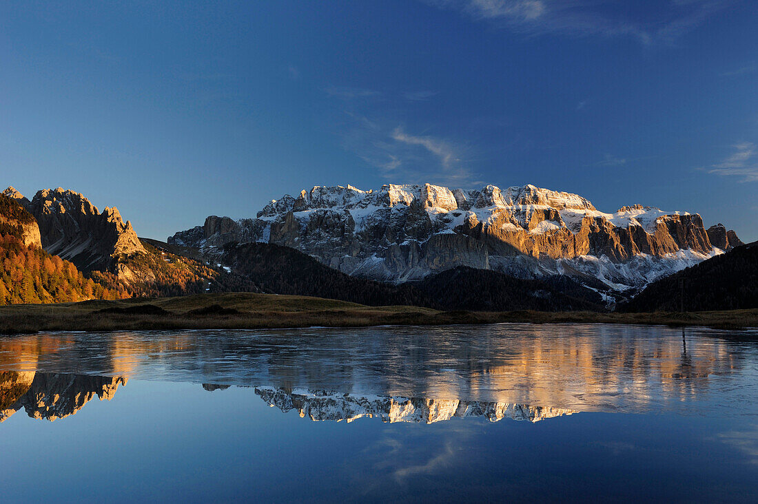 Sella range reflecting in mountain lake, valley of Groeden, Dolomites, UNESCO World Heritage Site Dolomites, South Tyrol, Italy, Europe