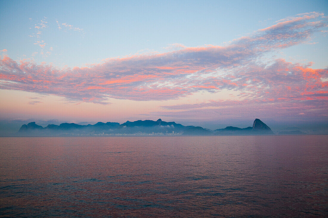 Approaching Rio coastline with Pao de Acucar, Sugar Loaf, Mountain at dusk, seen from cruise ship MS Deutschland, Reederei Peter Deilmann, Rio de Janeiro, Rio de Janeiro, Brazil, South America