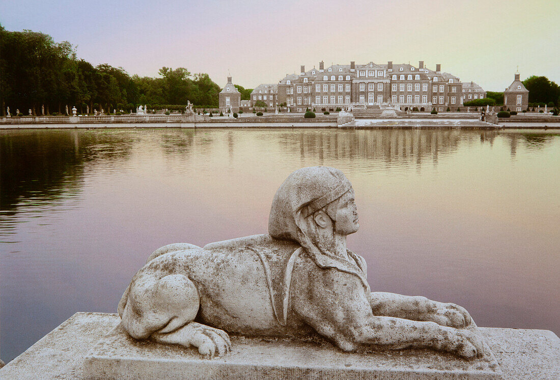 Sculpture of a sphinx in front of Nordkirchen moated castle,  Muensterland, North Rhine-Westphalia, Germany, Europe