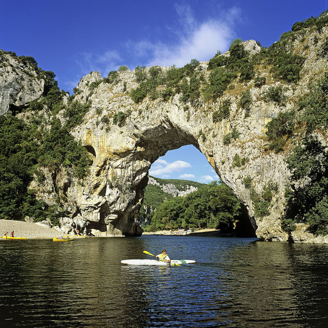 Across, active, activity, adventure, agility, agreeable, amusement, arc, arch, Ardèche, attraction, blue, boat, boy, canoe, canoeing, carefree, Caucasian ethnicity, climate, Color image, contemporary, day, destination, discovery, ecosystem, effort, enchan