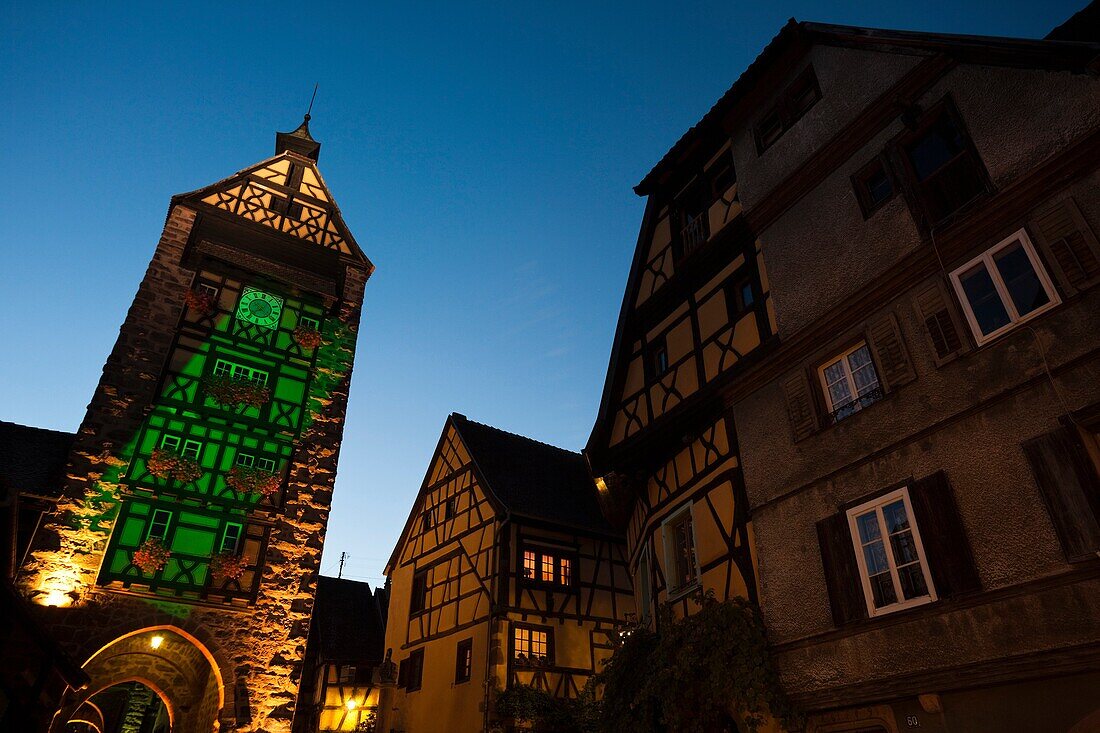 France, Haut-Rhin, Alsace Region, Alasatian Wine Route, Riquewihr, Obertor tower, evening