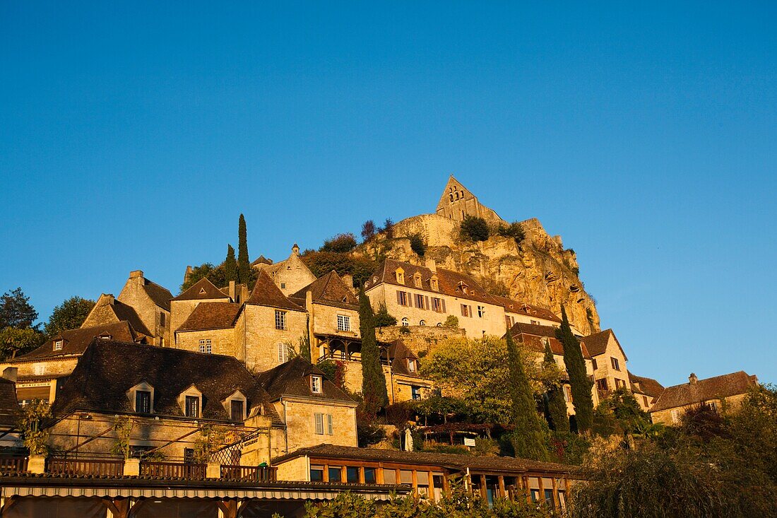 France, Aquitaine Region, Dordogne Department, Beynac-et-Cazenac, town on the Dordogne River, sunset