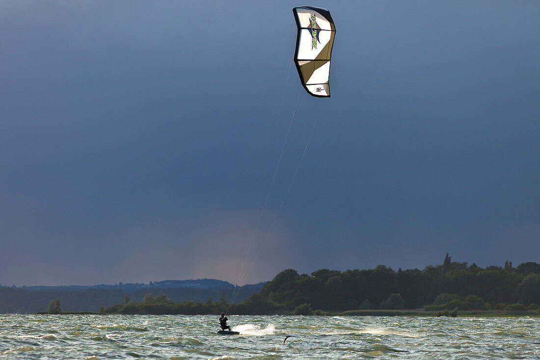 Kitesurfer at lake Chiemsee, Chieming, Chiemgau, Upper Bavaria, Germany
