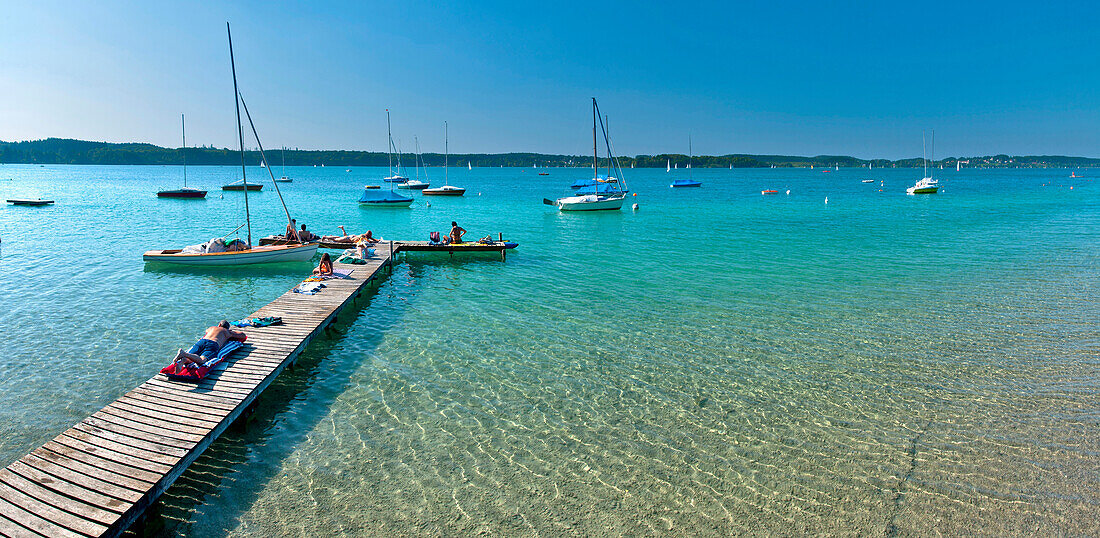 Bathing jetty at lake Worthsee, Seefeld, Upper Bavaria, Germany