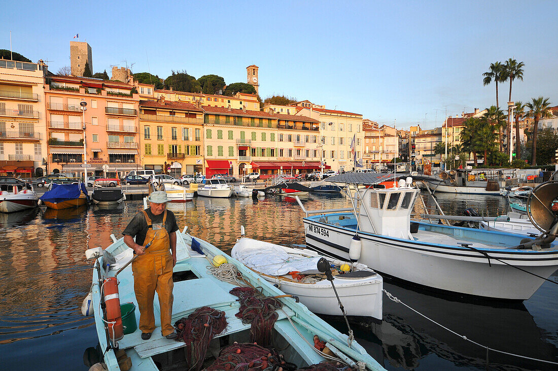 Fisherman at the old harbour, Cannes, Cote d'Azur, South France, Europe