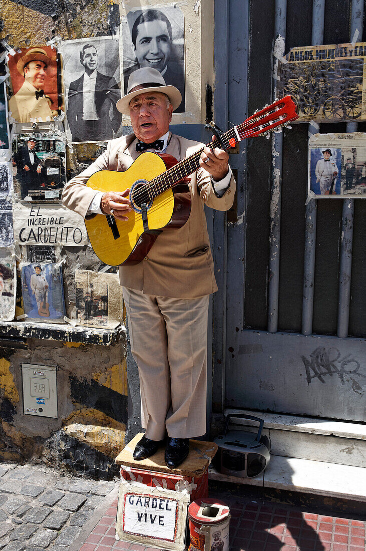 Gardelito, Tango street musician with guitar, San Telmo, near Plaza Dorrego, Buenos Aires, Argentina