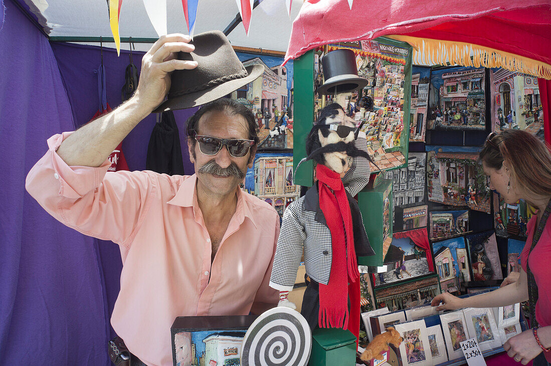 Daniel Falco, artist at Antique market, Plaza Dorrego, San Telmo, Buenos Aires, Argentina