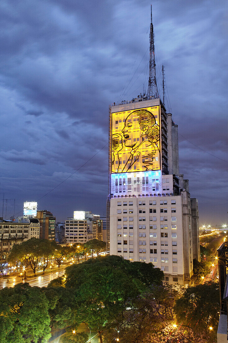 Evita Peron at the facade of the ministry of public works, Avenida 9 de Julio at night, Buenos Aires, Argentina