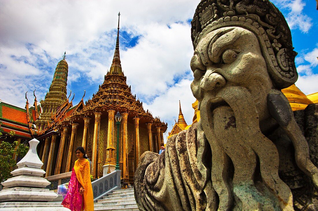 Chinese warrior statue with golden chedi  Wat Phra Kaew Emerald Buddha Temple and Grand Palace  Bangkok, Thailand, Southeast Asia, Asia