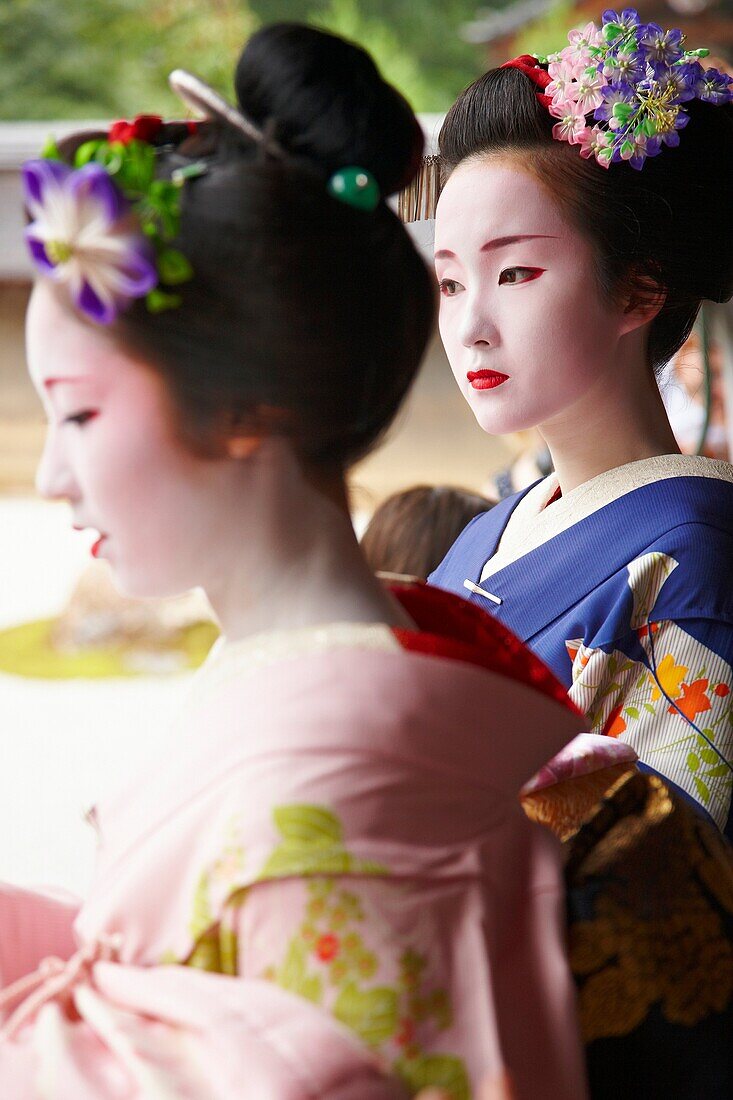 Maiko, Geisha, The Rock Garden, Ryoanji Temple, Kyoto, Japan.