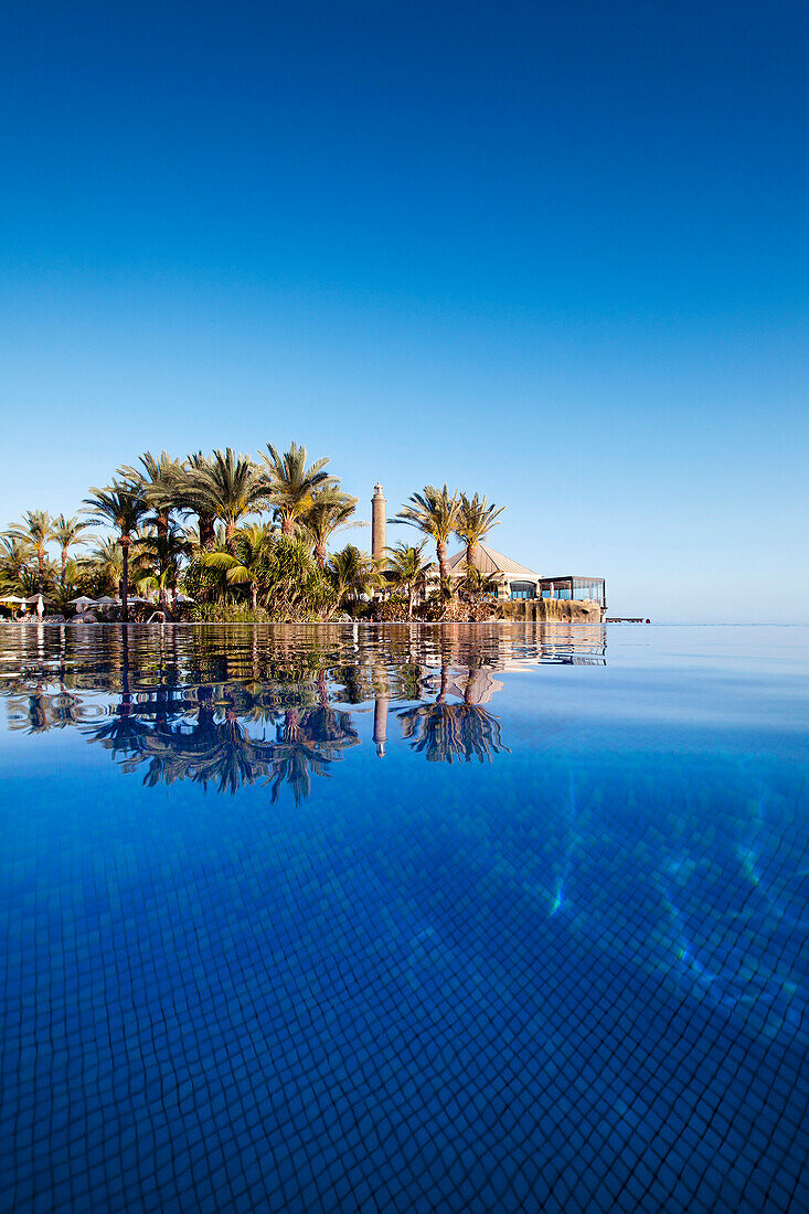 Pool of the an Grand Hotel under blue sky, Meloneras, Maspalomas, Gran Canaria, Canary Islands, Spain, Europe