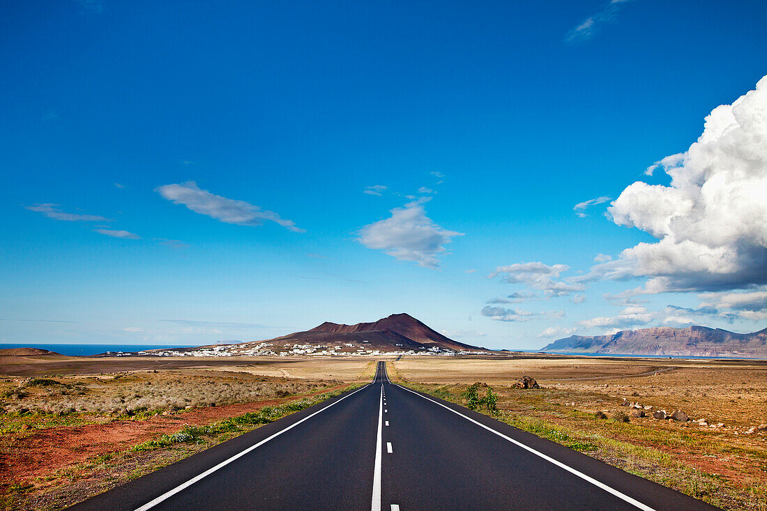 Street leading towards Soo village and Caldera Trasera, Lanzarote, Canary Islands, Spain, Europe