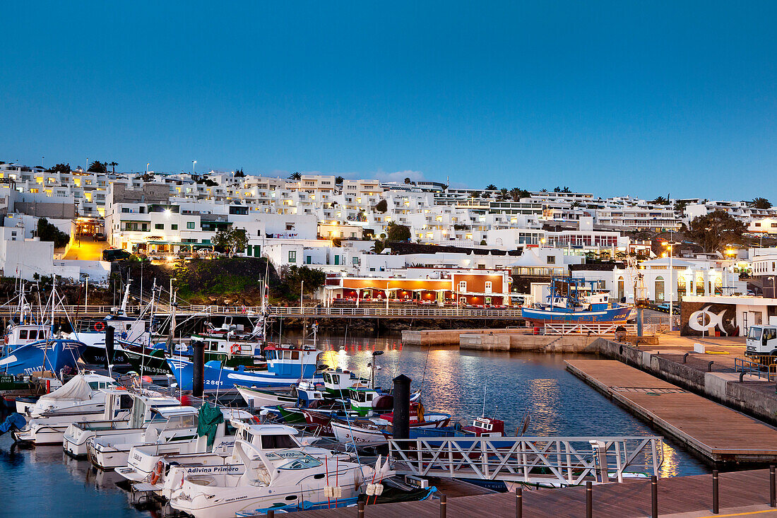 Illuminated harbour in the evening, Puerto del Carmen, Lanzarote, Canary Islands, Spain, Europe