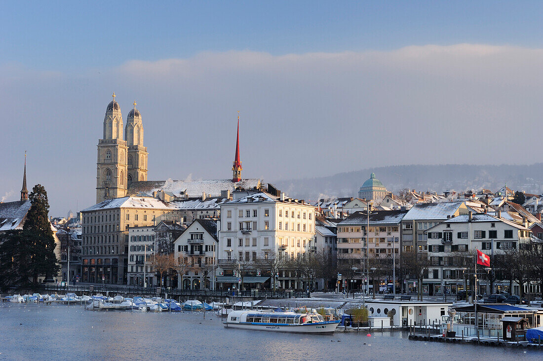 Church Grossmuenster with river Limmat in foreground, Zurich, Switzerland