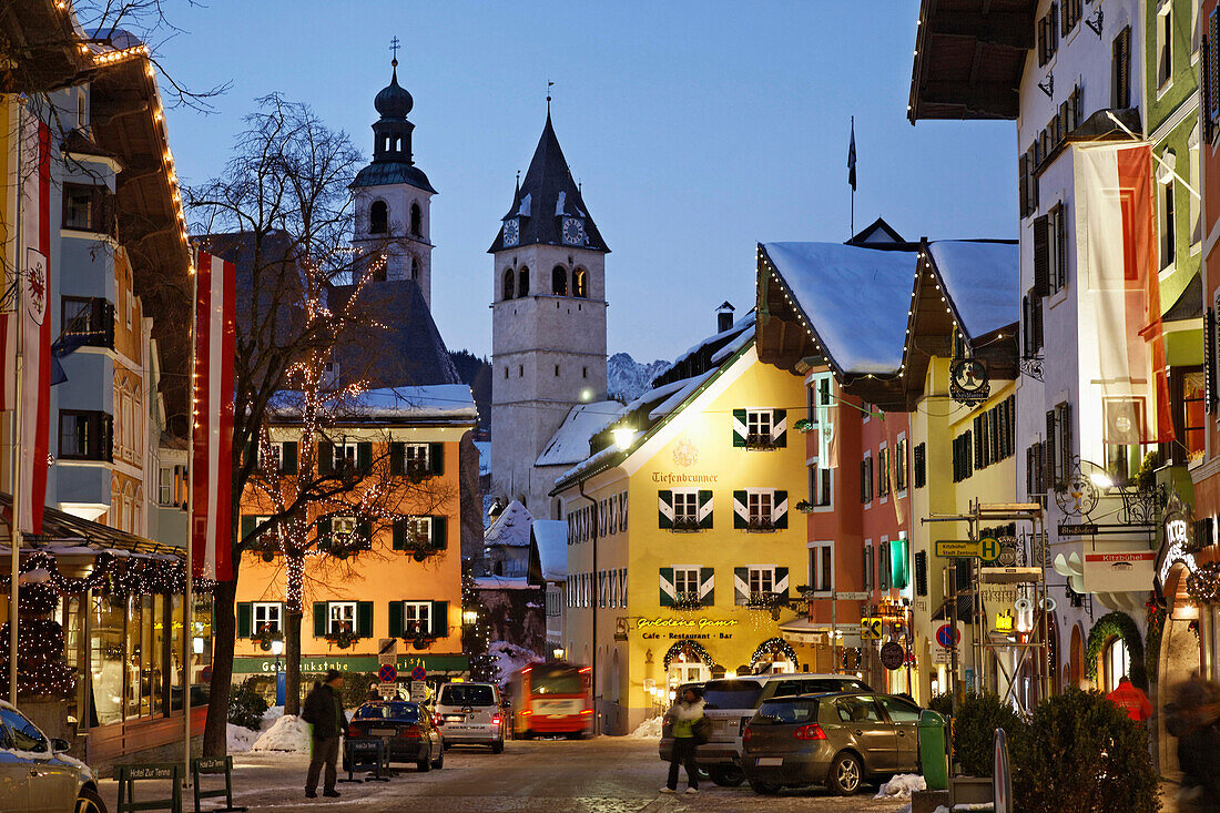 Shopping street in the evening, Old Town, Parish Church and Liebfrauen Church, Vorderstadt, Kitzbuhel, Tyrol, Austria