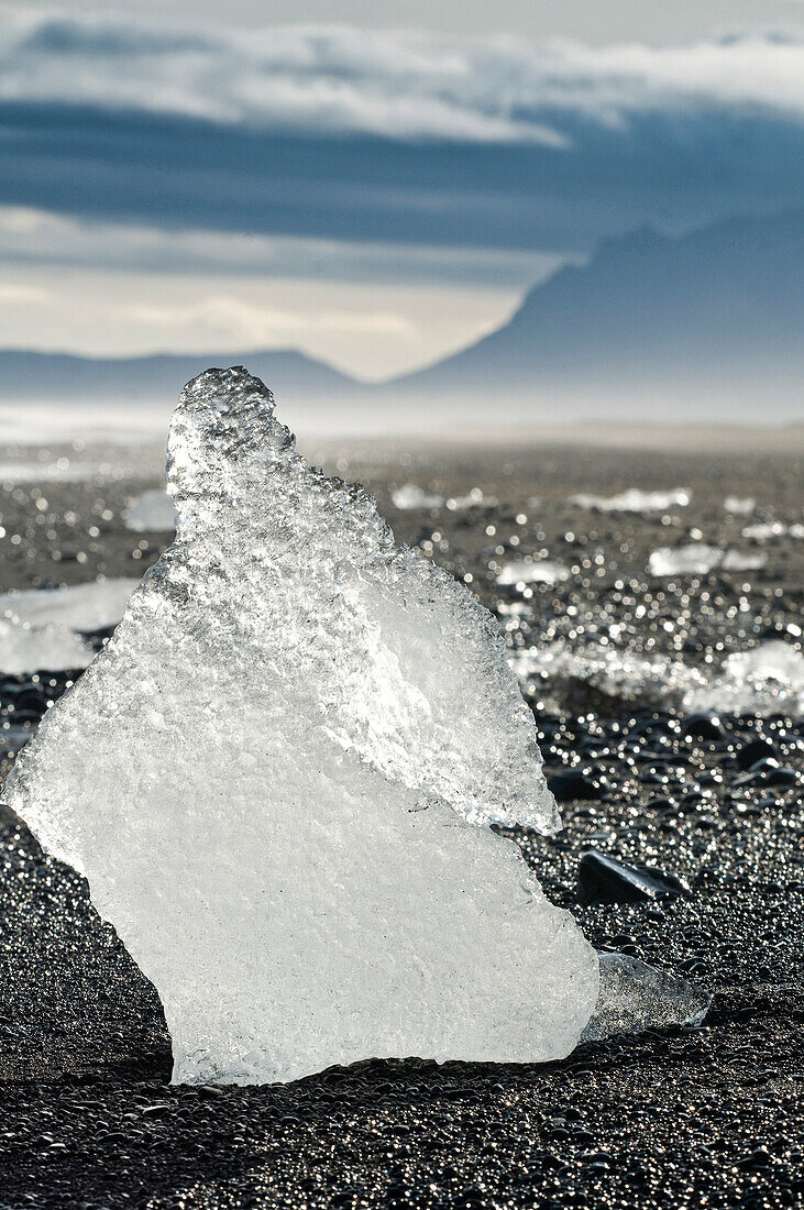Block of ice on the beach, Jokulsarlon Glacier lake, Iceland, Scandinavia, Europe