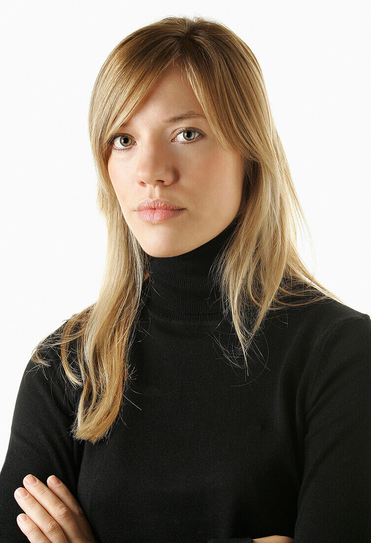 Young blonde woman with green eyes, Arms folded