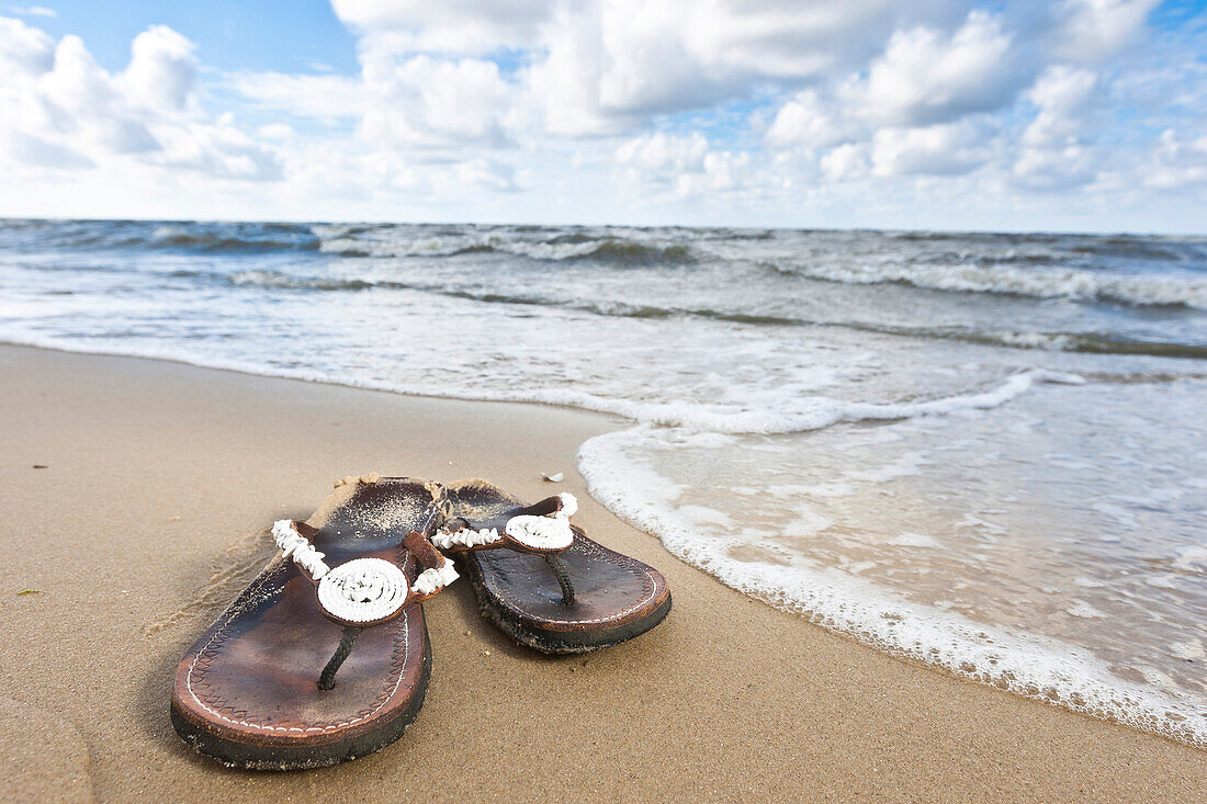 Sandals on thebeach, North Sea coast, Lower Saxony, Germany, Europe