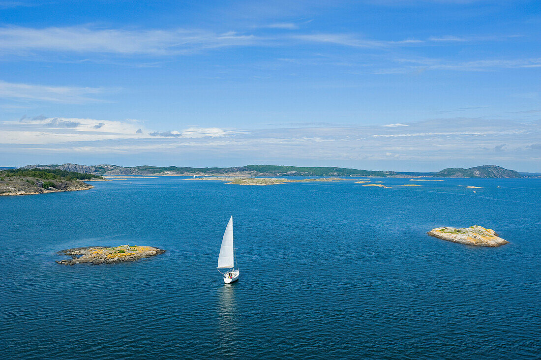 Fjord with sailing boat close to Marstrand, Bohuslan, Vastra Gotalands lan, Sweden, Europe