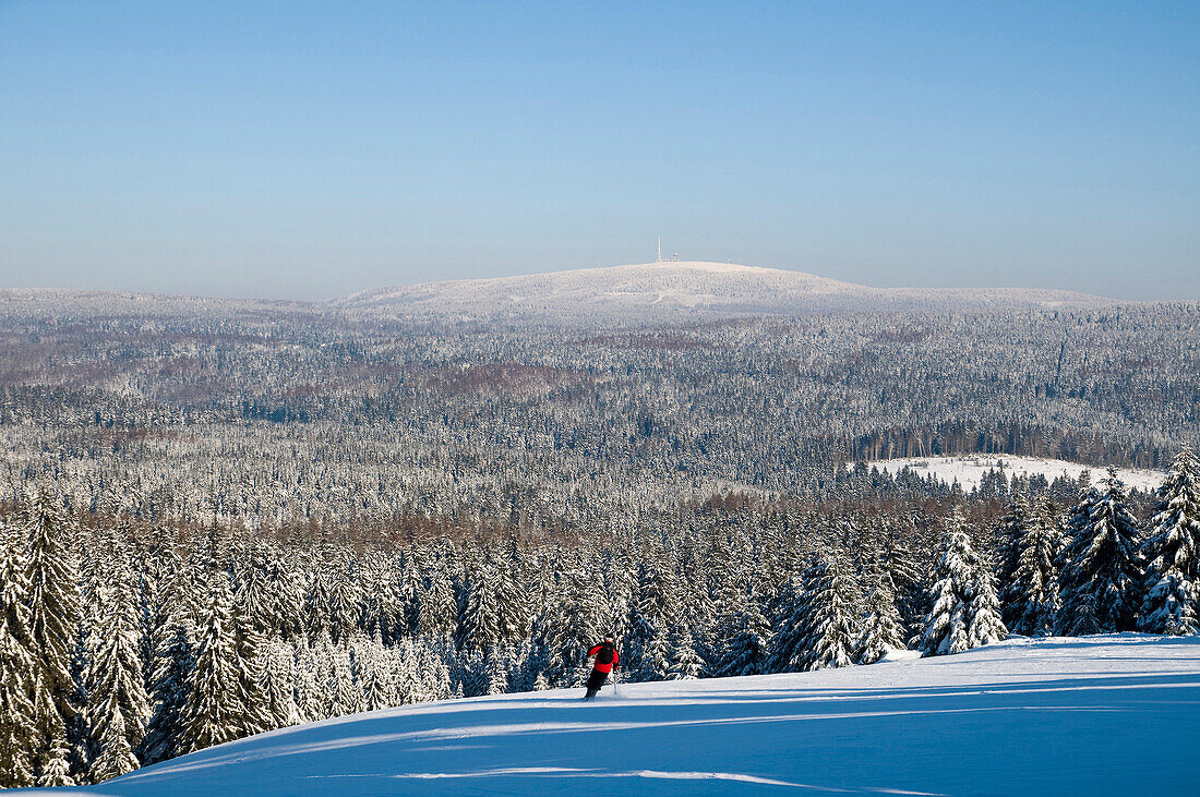 Ski area Kleiner Sonnenberg, Brocken mountain in the background, Harz, Lower Saxony, Germany